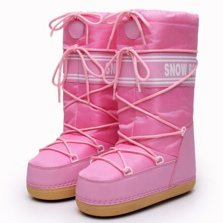 Bottes hautes roses de ski à lacets pour femme